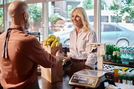 depositphotos_680036998-stock-photo-focus-jolly-mature-customer-smiling